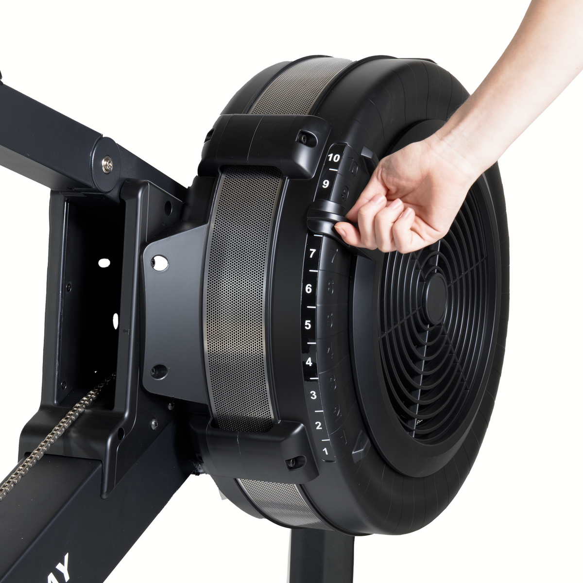 Hand using a rowing machine handle with a white background