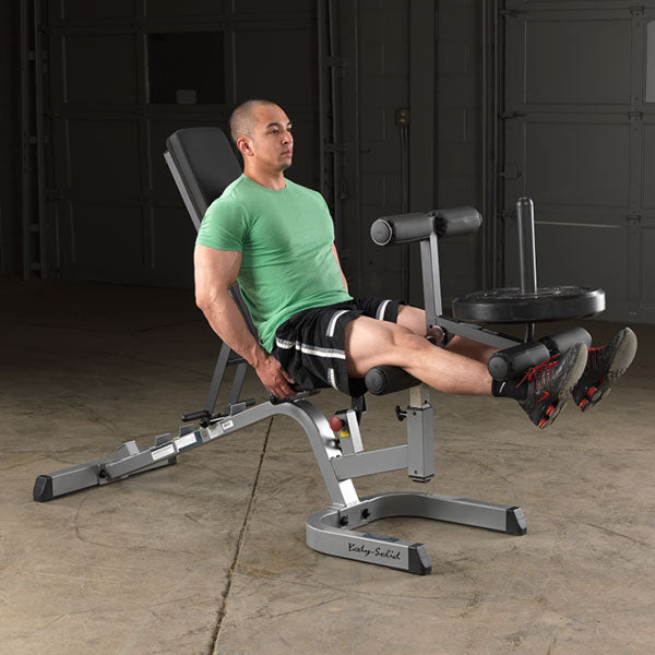 Body-Solid OAS14 14&quot; Olympic Adapter Sleeve view with weight plates | Fitness Experience