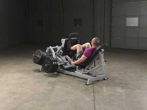 Body-Solid LVLP Leverage Horizontal Leg Press with weight plates | Fitness Experience