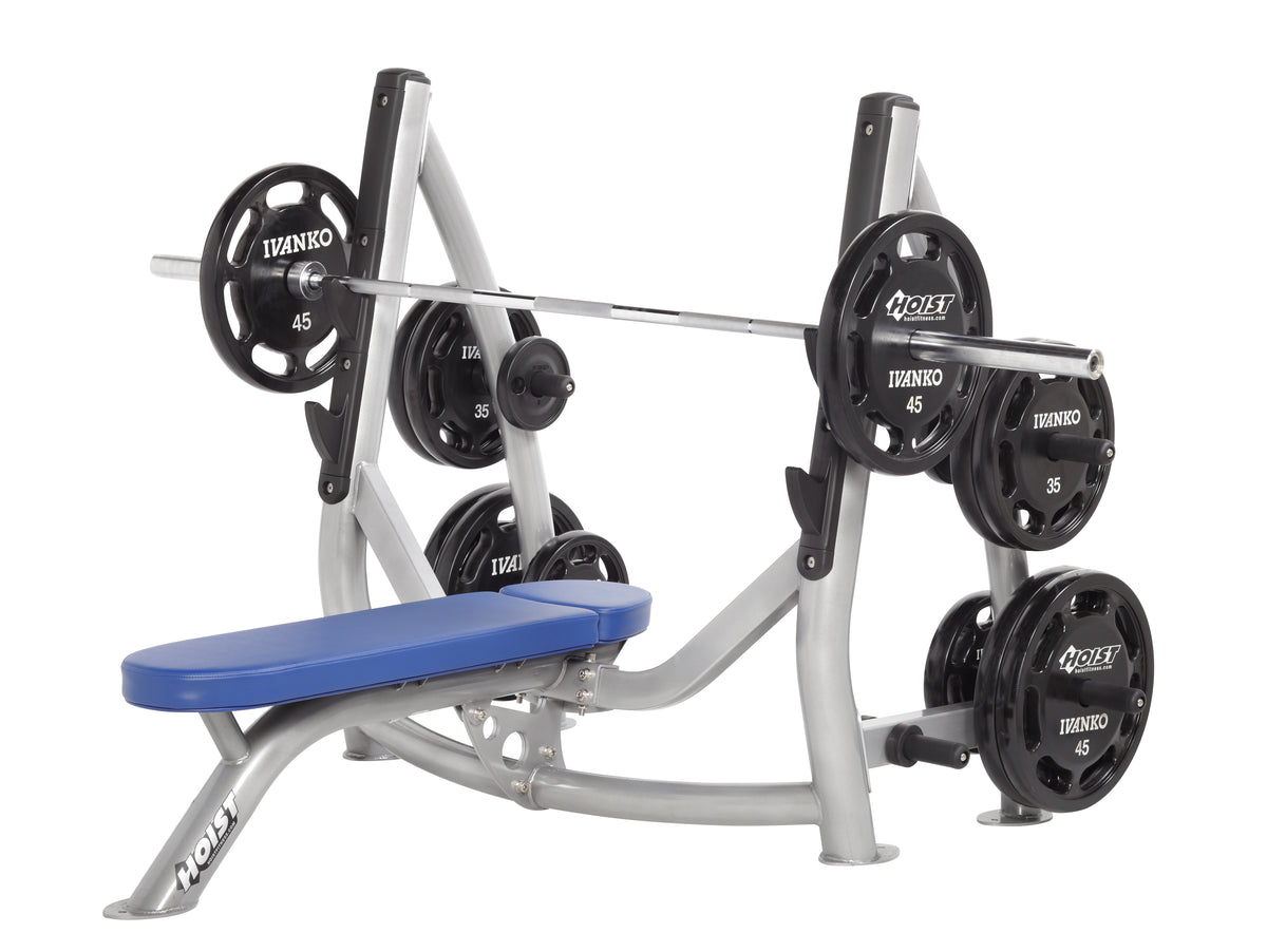 Hoist Fitness CF-3170-A Olympic Flat Bench with Storage view with weights and bar | Fitness Experience
